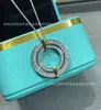 Marque de créateurs Tiffayss même émail en forme de coeur Collier clés féminins léger vent bleu coeur rose amour clavicule clé pendentif avec logo