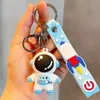 2024 Cartoon series silicone material Astronaut keychains graduation small gift takeaway milk tea shop drainage small gift couple car key pendant