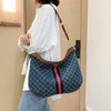 2024 Neue Designerin Damen Crossbody Schulter weibliche Mode große Kapazität Single Messenger Rucksack Big Bag Leinwand Achselhöhle Handtaschen Outlet Outlet