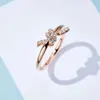 Designer -Marke Knoten Halskette für Frauen leichter Luxus und Nische Roségold Bogen Ring Ring Ring Colarbone Kette rein Silber Set lächelnde Trend