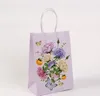 Подарочная упаковка 24шт/лот милый цветочный печатный крфт -бумажный пакет фестиваль фестиваль сумки с ручками детей
