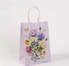 Enveloppe-cadeau 24pcs / lot mignon de fleurs à fleur de festival de festival Kraft Sacs de festival avec des enfants