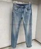 Designer maschile jeans ad alto triangolo di lusso etichetta jeans azzurra per maschi 2024 primavera/estate nuovi pantaloni slim alla moda maschile