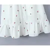 Robes décontractées yenkye femmes douces bouton avant Strawberry Imprimerie robe blanche Robffle carré Coule volante manche femme sexy élégante