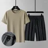 Tracksuits voor heren mode losse elastische taille zakken all-match bandage sets 2024 mannen kleding zomer oversized vaste kleur casual casual