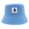 Fisherman d'été Coup de casquette Couleur solide Sunshade et vêtements de travail de crème solaire, étiquette de mode de couple de bassin décontracté, chapeau solaire, humidité des autocollants