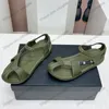 24SS Womens flätade sandaler glider på bilder damer sommar utomhus strandsko slingbacks klädskor klassisk fritidsko svart brun casual sko med dammväskor