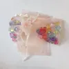 Enveloppe cadeau 100pcs Sacs d'organza à craqs