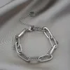 Titanium Steel Material Fashionabla Gold Long Chain Pendant, dubbelskikt tjockt armband, kvinnors trendiga varumärke Tillbehör