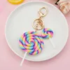 Keychains Lonyards Nouveau simulation arc-en-ciel Lollipop Keychain Car Sac Pendentif Résine Soft Céramique Small Gift K2309 Q240403