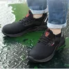 Chaussures décontractées Mesh Breathable Men's Work Anti-Smashing Steel Toe Conception à lacets Flats sans glissement Sécurité résistante