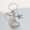 Keychains Lanyards Fashion Pearl Starfish Shell Alloy Keychain Silver Color Sea Key Chains för att göra handgjorda DIY -smycken Tillbehör Fynd Q240403