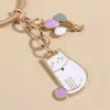 Keychains Lonyards mignon émail chat keychain gras ballon key ring kitten chaînes pour femmes vêtements hommes portefeuille caricaturé caricatures q240403