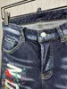 Pantaloncini da uomo Trend di moda lettera da uomo Shorts in denim stampato Slimt foro casual spray Shorts High Street A601-1 J240407