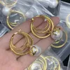 مصمم الأزياء الفاخرة وصول الأزياء الفاخرة بعلامة تجارية مصممة أقراط عشيرة Gold Geometry Love Vintage Earjewelry for Women Orrings Molems Jewelry Party Gift