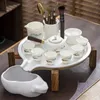 Tee -Sets Home White Pottery Tea Set kreativer Keramikstein gemahlenes Tablett moderne einfache Glasfussee Teetasse