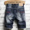 Men's Shorts 2022 Fashion Graffiti Tear Mens Jeans Shorts Patches Worn Five Cent Beggar Denim Pants High Quality Brand Jeans Mens Wear J240407