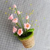 Fleurs décoratives Pot de fleur de rose tricot à la main