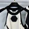 BA1 Main Women's Outerwear Vest Luxury Brand Designer Summer Classic Top Black and White Sticking Hanging Neck Vest Camellia Slim Fit Sticked tröja