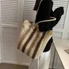 Sac féminin de plage du soir sacs féminins à l'herbe tissée française de style hepburn épaule d'été de grande capacité