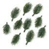 Dekorative Blumen 10pcs Künstliche Kiefernnadeln Gefälschte Pflanze für Weihnachtsdekorationen Wohnkultur Jahr 2024 DIY BRÜFUNG GARLANDS Geschenk