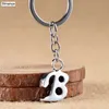 Keychains Lanyards Simple Diy 26 lettre Metal Keychain Men Femmes Femmes mignonnes Key Chain Party Gift Bijoux Car Anneau Q240403