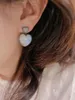 Boucles d'oreilles étalon 2024 European et Américain 925 Love en argent sterling incrusté de Moonlight Stone polyvalent frais