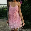 Paillettes sexy paillettes de filets plume mini robe femme spaghetti drap robes de couture femelles de fête de fête de soirée élégante 240328