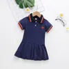 Robes de fille 2024 Fashion d'été pour enfants en coton à manches courtes à manches courtes brodées robe plissée sportive pour filles 1 à 6 ans