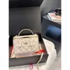 Torba na ramię 75% Fabryka gorąca promocja Nowa Xiaoxiangfeng Golden Ball Mini Box Bag damskie Łańcuch Lingge One Crossbody Makeup Bag