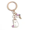 Keychains Lonyards mignon émail chat keychain gras ballon key ring kitten chaînes pour femmes vêtements hommes portefeuille caricaturé caricatures q240403