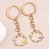 Keychains Lonyards 1set (2pcs) mignon émail en émail porte-clés fleur papillon cristal clé jardin de jardins pour les cadeaux d'amitié bijoux faits à la main Q240403