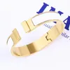 Bracelet doré bracelet bracelet femme hommes classiques bijoux en titane acier 20 couleurs select de haute qualité non décolorante unisexe cadeau bracelets argenté bracele