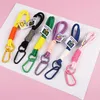 Keychains Lanyards Outdoor backpack rope keychain nylon woven mens and womens mountaineering buckle couples bracelet handbag pendant internet famous car Q240403