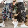 Linage d'été Capris Mens Shorts décontractés de style chinois lâche grand pantalon de plage lanterne de chanvre thaïlandais mode