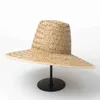 Chapéus de aba larga balde Europa Europa retro top big straw chapéu de palha masculino cápsula cravilha modelagem côncavo protetor solar sombreamento de praia chapeu q240403