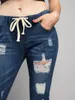 Damskie spodnie dżinsowe 2024 Summer Street Ripped Trendsetter w trudnej sytuacji, prania o lekką osobowość dżinsowa kobieta