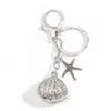 Keychains Lanyards Fashion Pearl Starfish Shell Alloy Keychain Silver Color Sea Key Chains för att göra handgjorda DIY -smycken Tillbehör Fynd Q240403