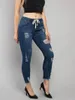 Damskie spodnie dżinsowe 2024 Summer Street Ripped Trendsetter w trudnej sytuacji, prania o lekką osobowość dżinsowa kobieta