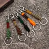 Keychains Lanyards MKENDN Double Chain Keychain Mens Handmade Weaving Outdoor Climbing Umbrella Rope Snake Knot Emergency Metal Keyring Q240403