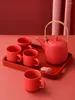 Tee -Sets 6pcs Becher Kaffeetasse Rot Keramik Trinkküste Set Haushaltswasser und Wasserkessel Wohnzimmer Tee Einfaches Jahr Geschenke