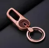 Keychains Lanyards New Top Metal Keychain con hombres de cuero Mujeres Cadena de llave de encanto de alta calidad Anillo de doble llave Ring Best Gift Jewelry K3154 Q240403