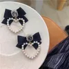 Dingle örhängen franska haute couture original design bow pärla hjärta överdriven hong kong stil temperament mode smycken smycken