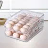 Boîte à œufs de rangement de cuisine avec récipient de couvercle Réfrigérateur Organisateur de glissière Conception de conception Roulement automatique pour la maison