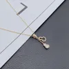 Klasyczne designerskie naszyjniki mikro-diamentowe tykwidowe wisiork Naszyjnik Krzyż Temperament Wykwintna osobowość koreańska biżuteria Tide Prezenty
