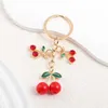 Keychains Lanyards Lovely Crystal Red Cherry Fruit Plant Key Rings for Women Girls Friendship Gift Handbag Decoration Handgjorda smycken Q240403