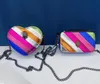 2024 Nouveau Kurt Geiger Eagle Head Rainbow Patch Cœur en forme de sac d'épaule marque Brand de téléphone mobile coloré