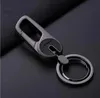 Keychains Lanyards New Top Metal Keychain con hombres de cuero Mujeres Cadena de llave de encanto de alta calidad Anillo de doble llave Ring Best Gift Jewelry K3154 Q240403