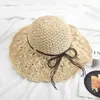 Brede rand hoeden emmer hoeden nieuwe vrouwen casual reisvoorziening zonbescherming strand hoed raffia stro hoed bowknot touw decoratie stro hoed 240407