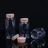 Bouteilles de rangement bouteilles en verre avec des pots d'épices de couvercles de liège souhaitant des bouteilles en verre pots en verre